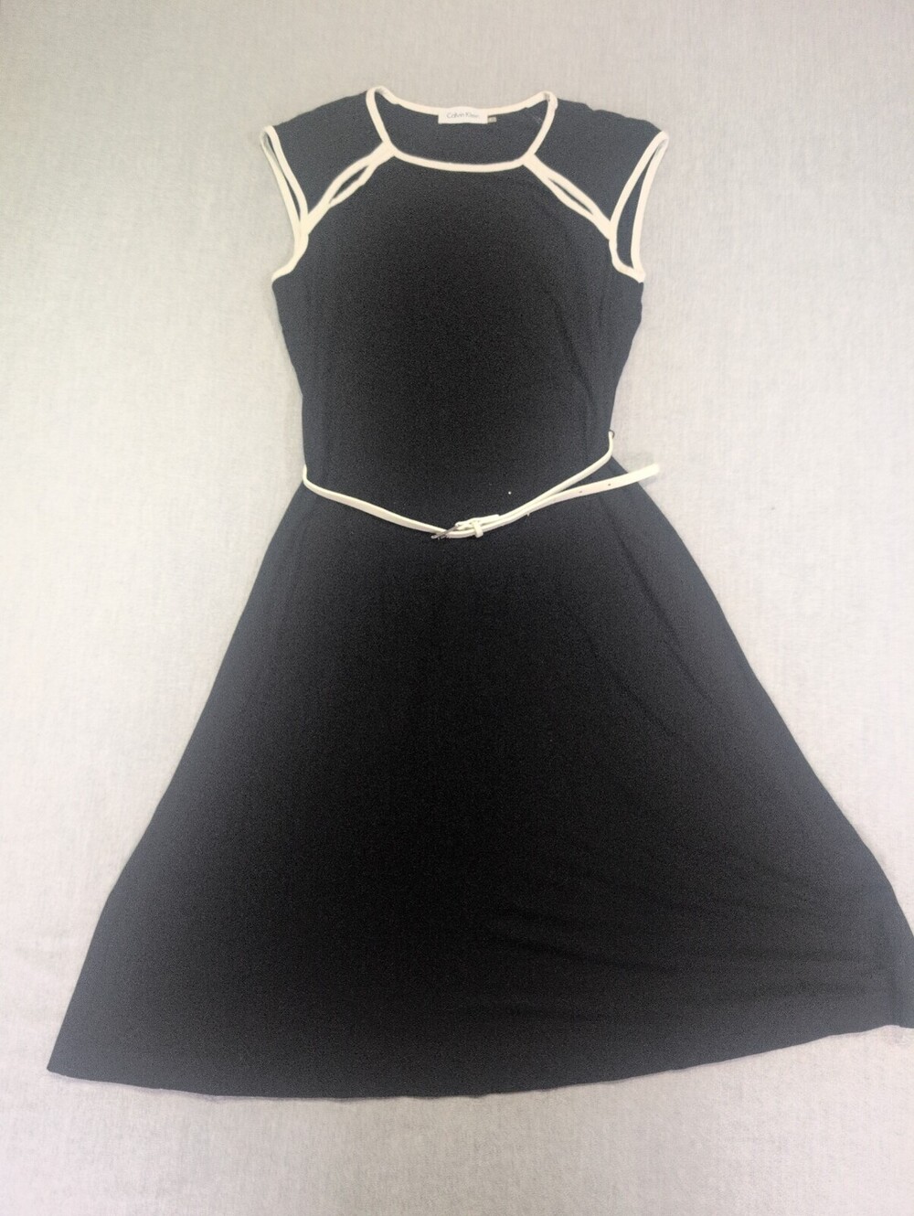 Calvin Klein black sleeveless dress with white trim belt size 2